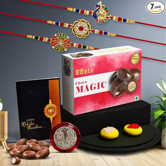 The Royal Heritage Rakhi Ensemble – Set of 5 Designer Peacock & Floral Rakhis with Artisanal Chocolates, Sacred Pooja Coin & Festive Tilak Essentials