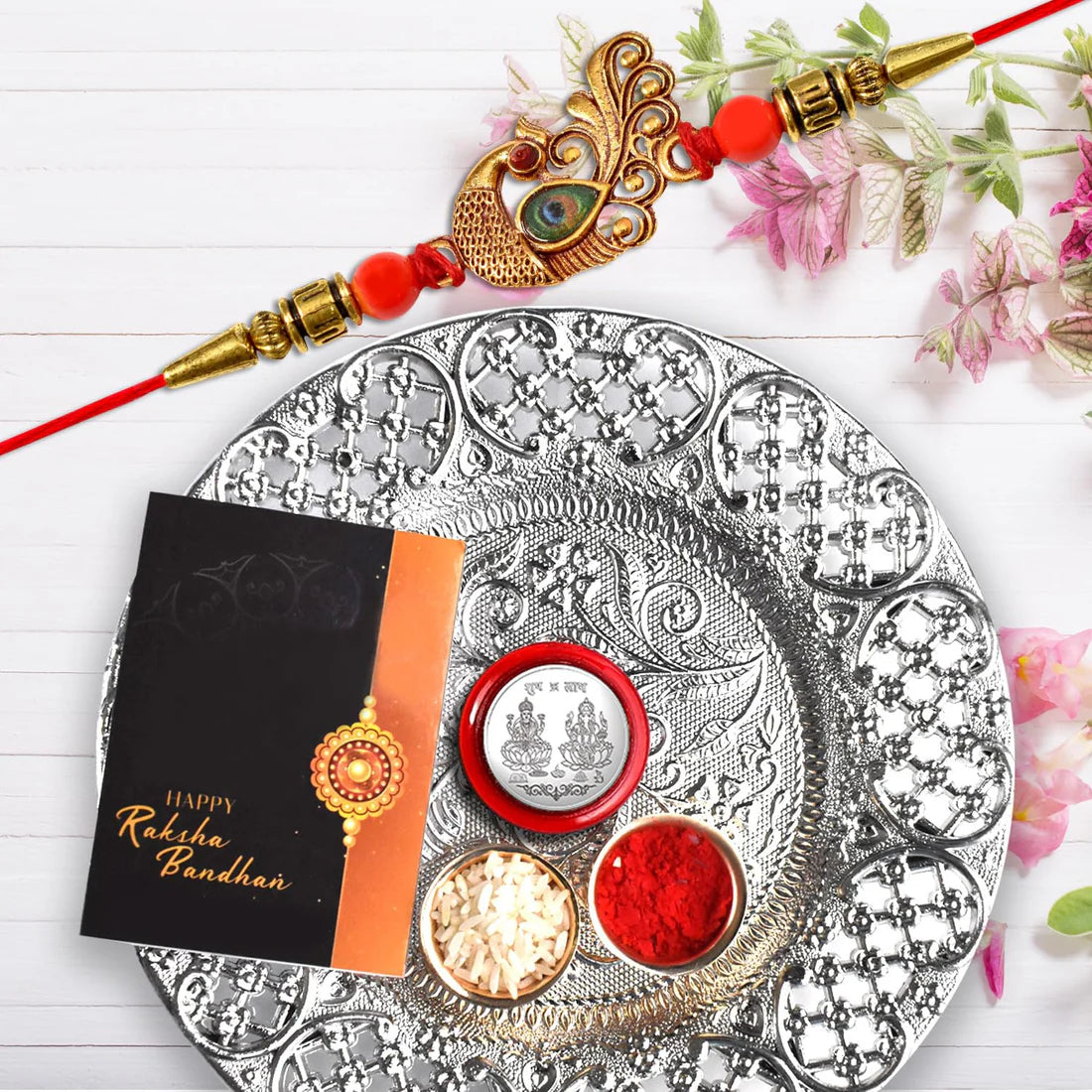 The Royal Peacock Rakhi Shubh Shuruat Hamper – Designer Peacock Rakhi with Decorative Silver Puja Thali, Auspicious Coin, Tilak Essentials & Gourmet Chocolate