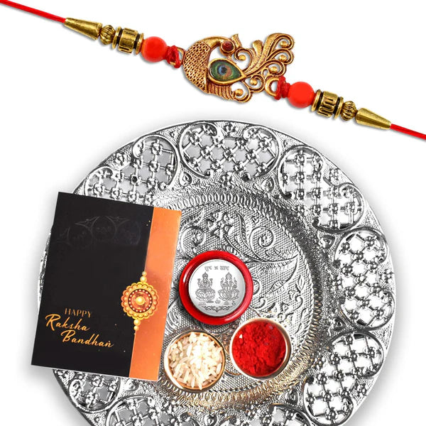 The Royal Peacock Rakhi Shubh Shuruat Hamper – Designer Peacock Rakhi with Decorative Silver Puja Thali, Auspicious Coin, Tilak Essentials & Gourmet Chocolate